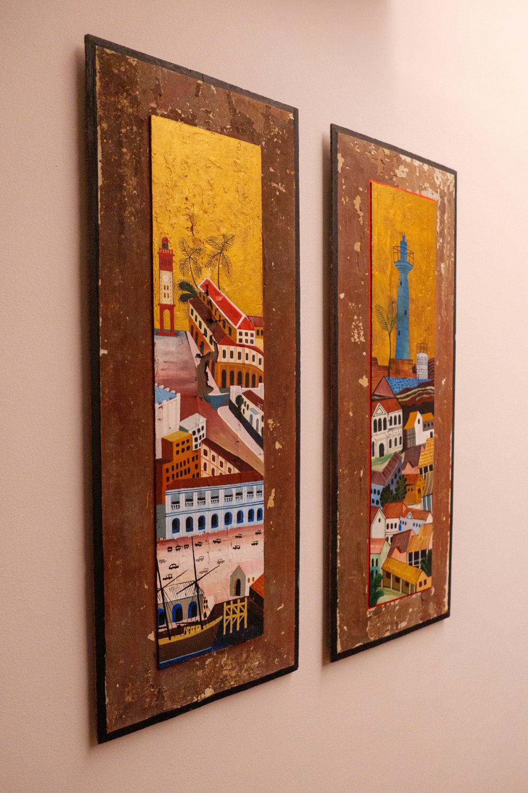 two-city-paintings-hang-on-a-wall-0tva7hj54lg